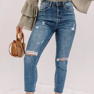 Risen medium distressed skinny jeans